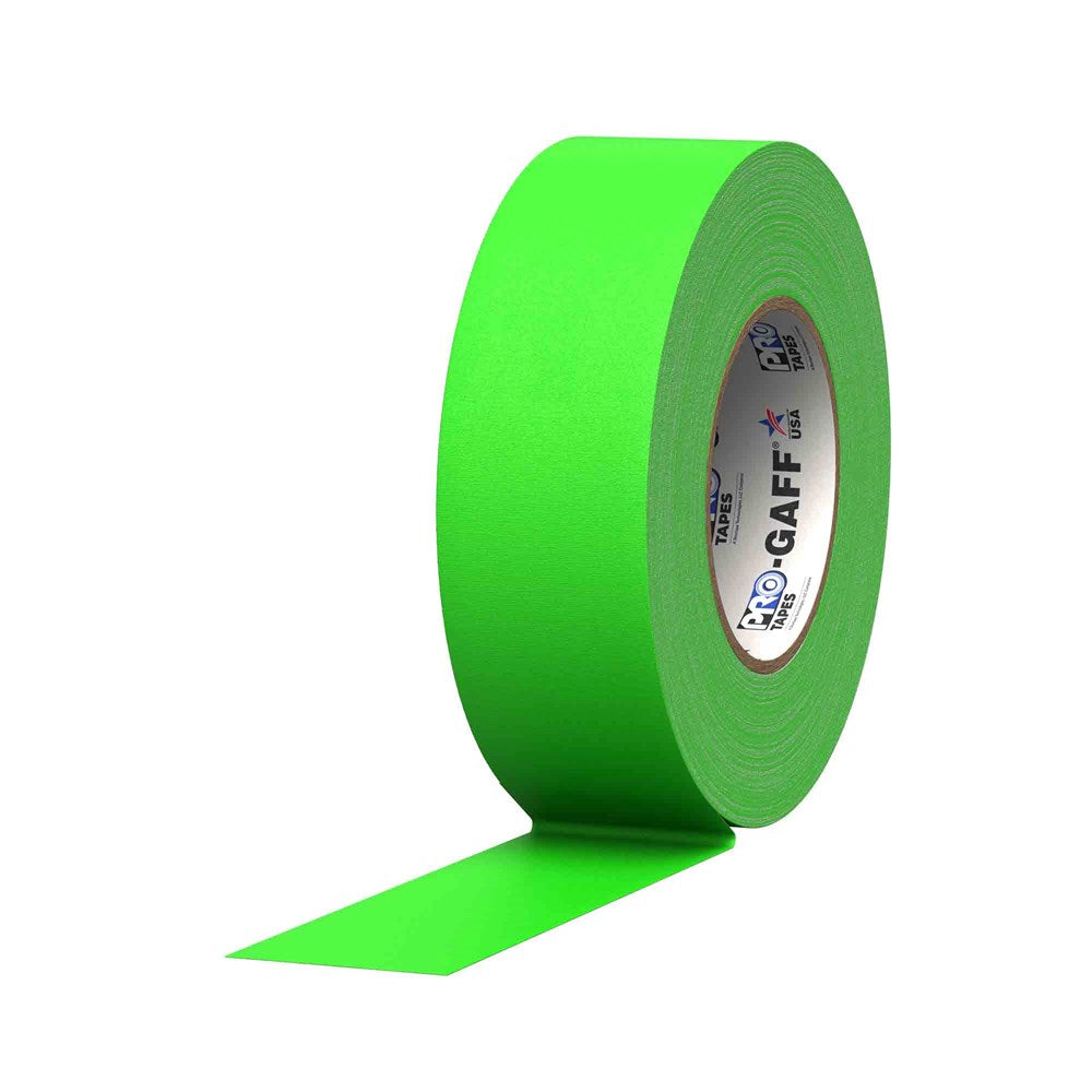 Bright fluorescent green cloth tape roll with smooth matte texture, partially unrolled strip visible.