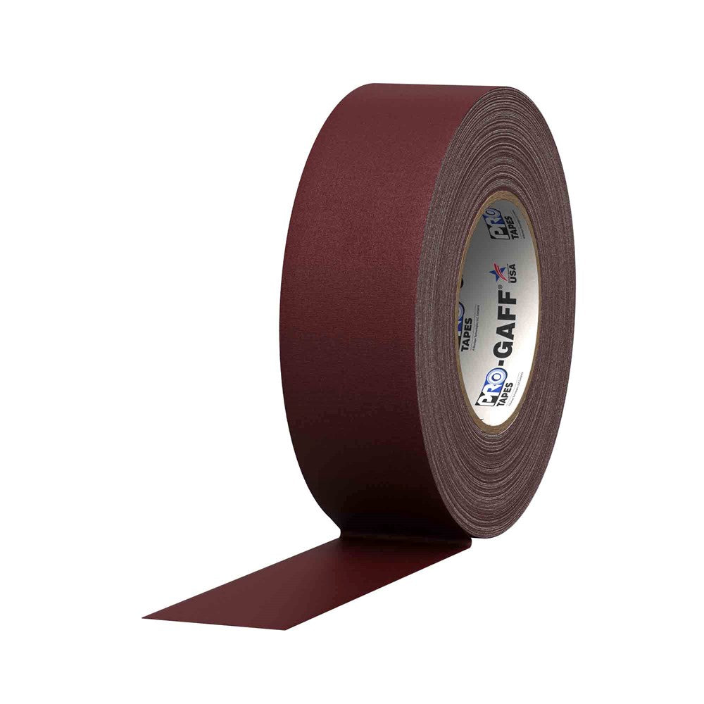 Burgundy cloth gaff tape roll partially unrolled with visible textured surface and Pro Tapes branding inside the core.