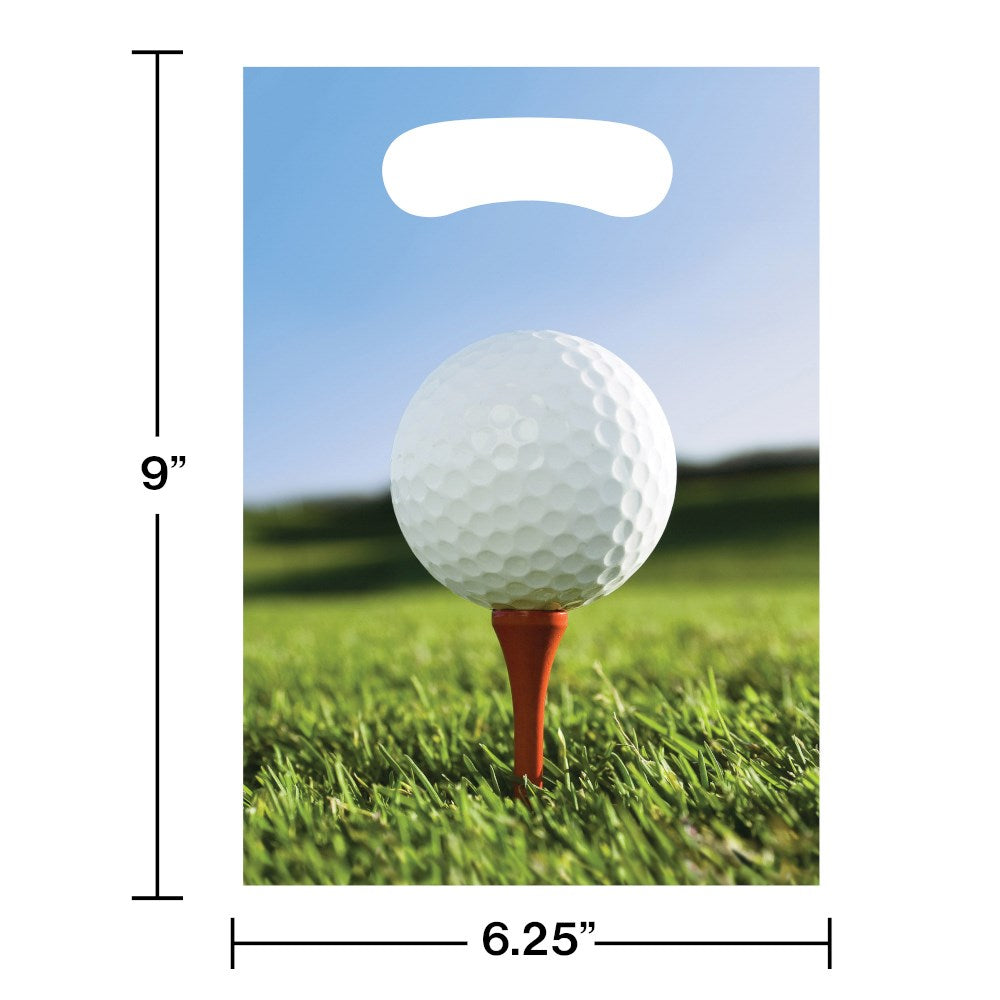 White golf ball on orange tee against grassy background on rectangular plastic loot bag.