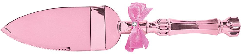 Pink shiny metal cake server with a bow detail on the handle, designed for baby showers.