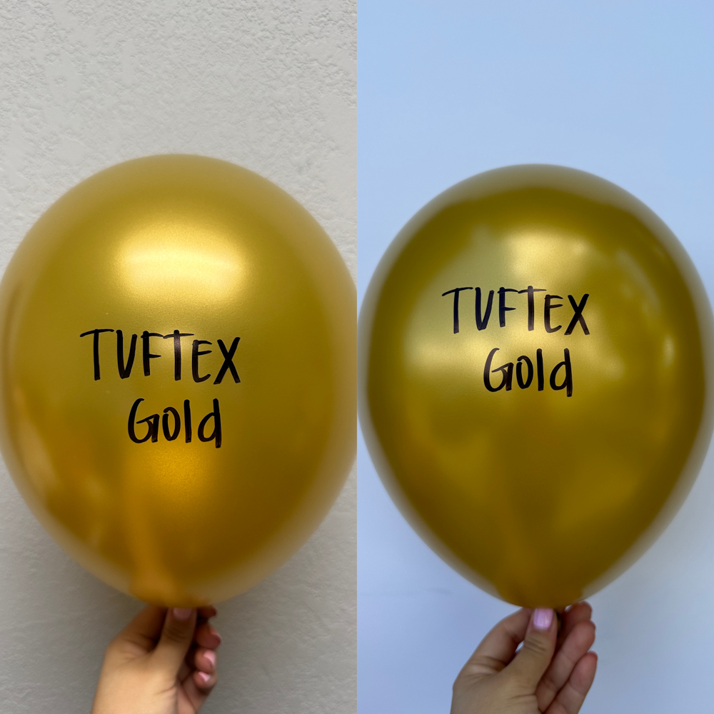 Set of two metallic gold latex balloons, each 11 inches, held against neutral and blue backgrounds, showing smooth shiny.