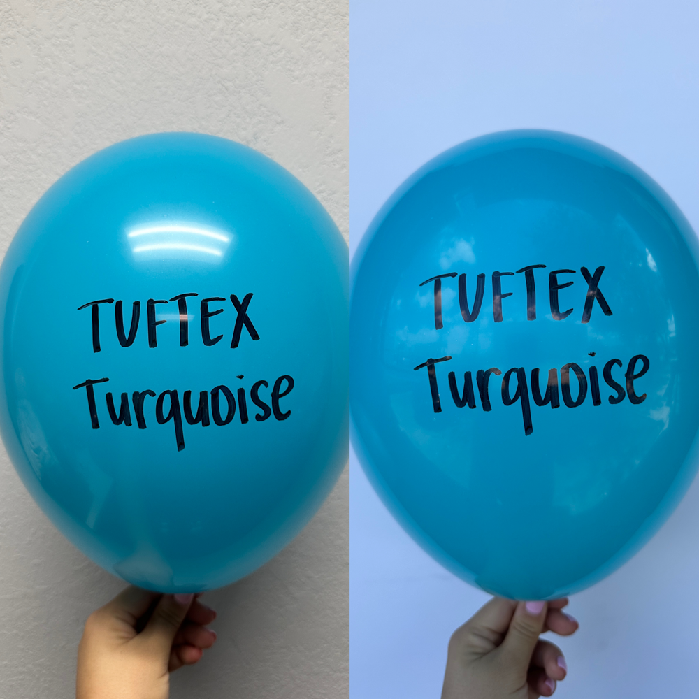 Bright turquoise 11-inch latex balloon inflated and held by hand with Tuftex branding visible.
