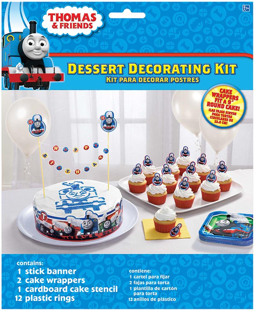 Blue and white Thomas & Friends dessert decorating kit with cake stencil, cupcake toppers, and wrappers featuring Thomas the