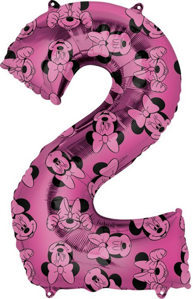 Pink foil balloon shaped as number 2 with repeating black Minnie Mouse faces pattern.
