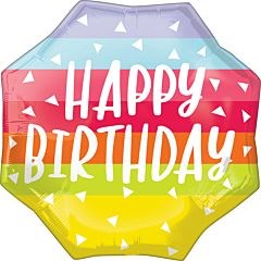 Hexagonal foil balloon with horizontal rainbow stripes and white "Happy Birthday" text surrounded by small white triangles.