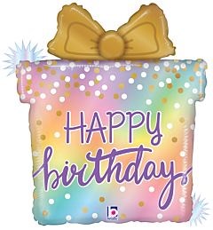 23-inch opal holographic foil balloon shaped like a gift box with gold bow and white confetti dots, reading "Happy Birthday"