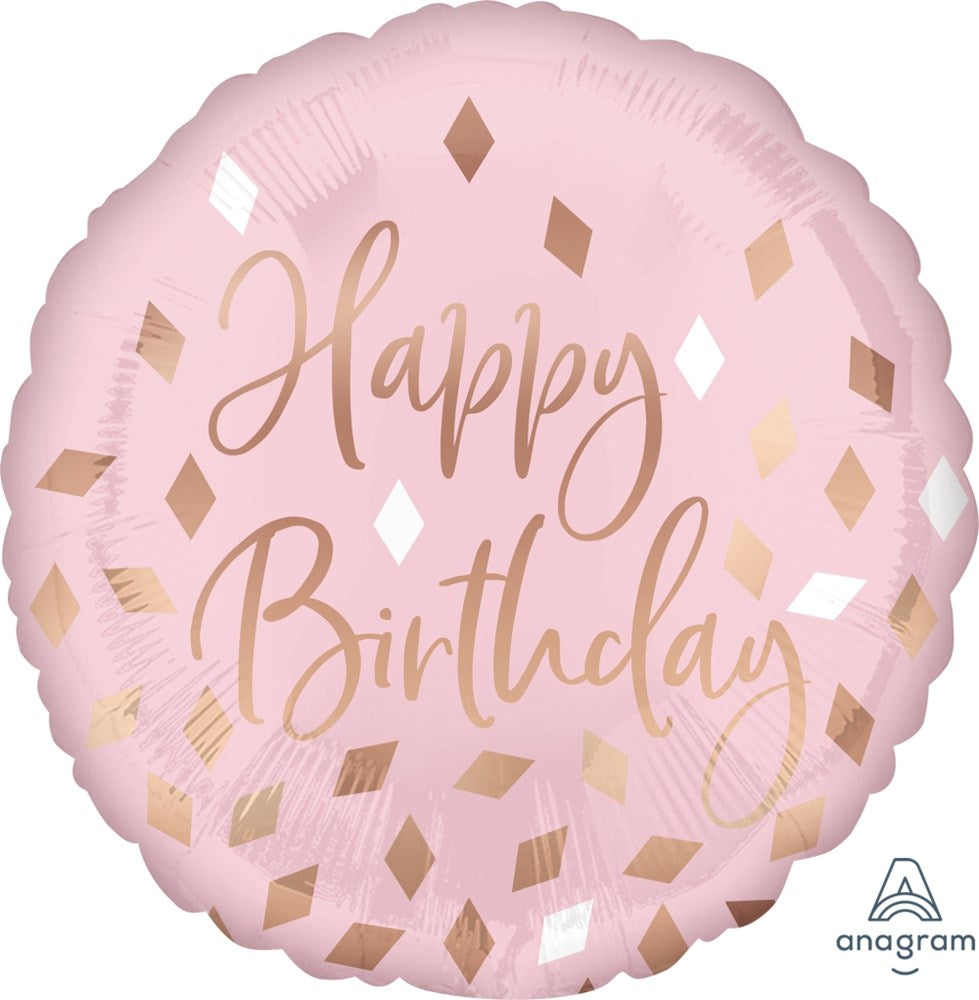 Round blush pink foil balloon with rose gold and white diamond shapes and "Happy Birthday" script lettering.