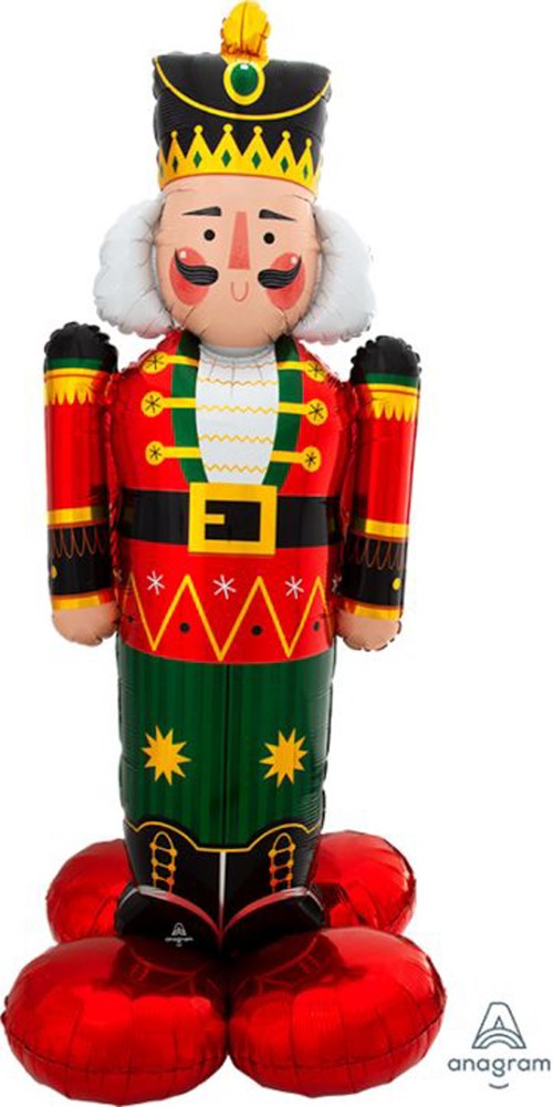 61-inch tall foil balloon shaped like a traditional nutcracker soldier in red, green, and black with gold accents and a.