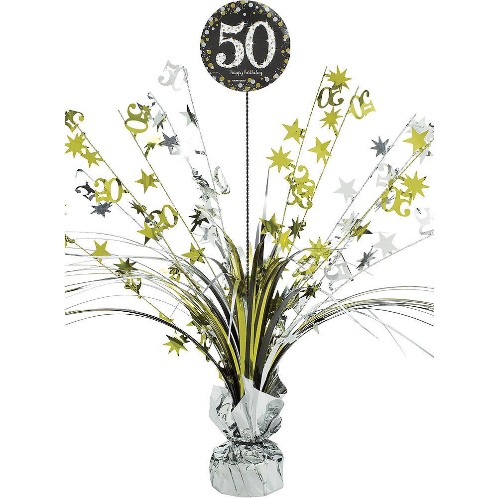 Black and gold "50" birthday spray centerpiece with metallic star bursts and foil base wrap.