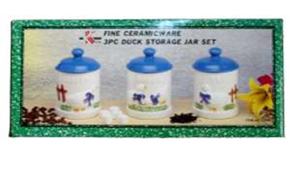 Three white ceramic storage jars with blue lids, each decorated with small duck illustrations and red bows.