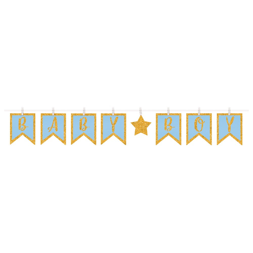 Light blue clothespin banner with gold glitter letters spelling "BABY," a gold star, and "BOY" on rectangular flags.