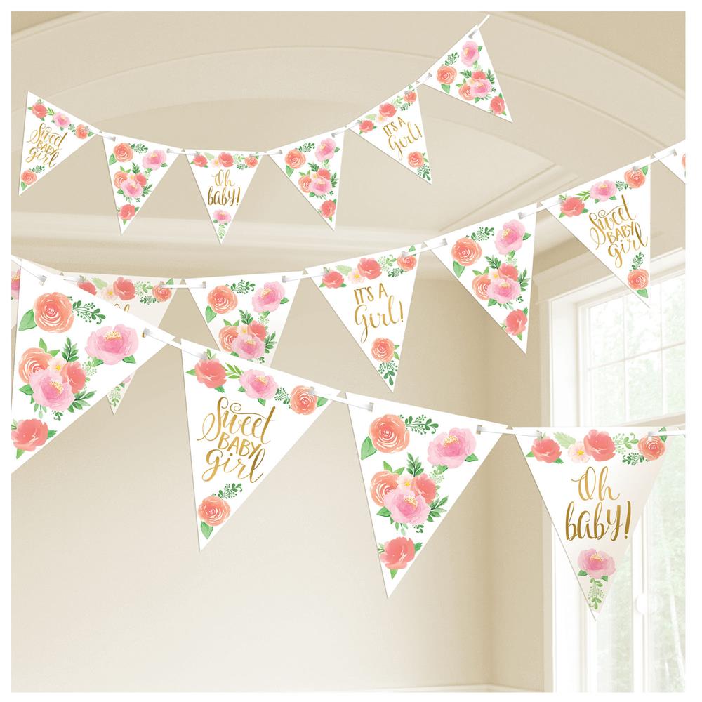 Floral baby pennant banner with white triangular flags featuring pink and coral flowers and gold foil lettering for baby.