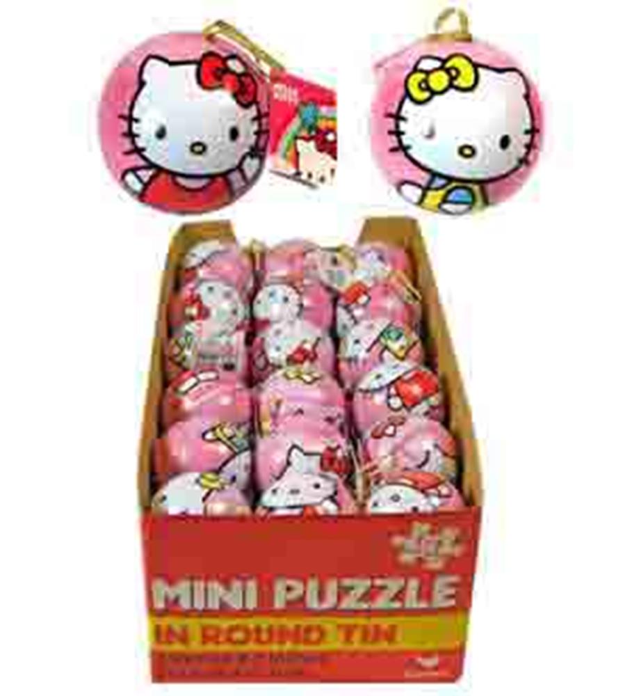 Pink round tin containers with Hello Kitty faces, featuring a bow and keychain attachment, displayed in a cardboard box.