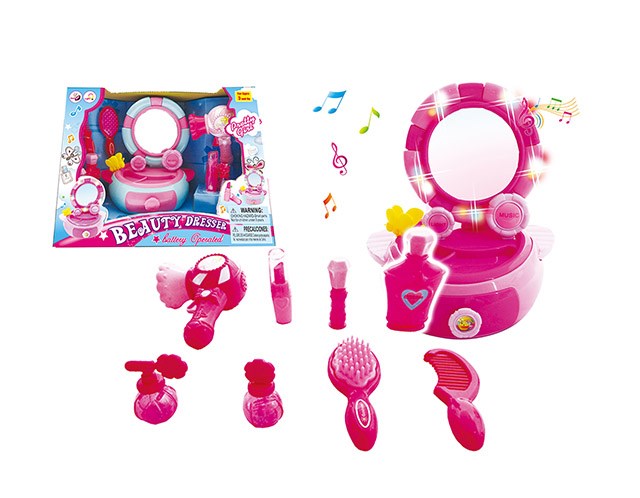 Pink plastic toy vanity set with round mirror, light features, and six matching beauty accessories.