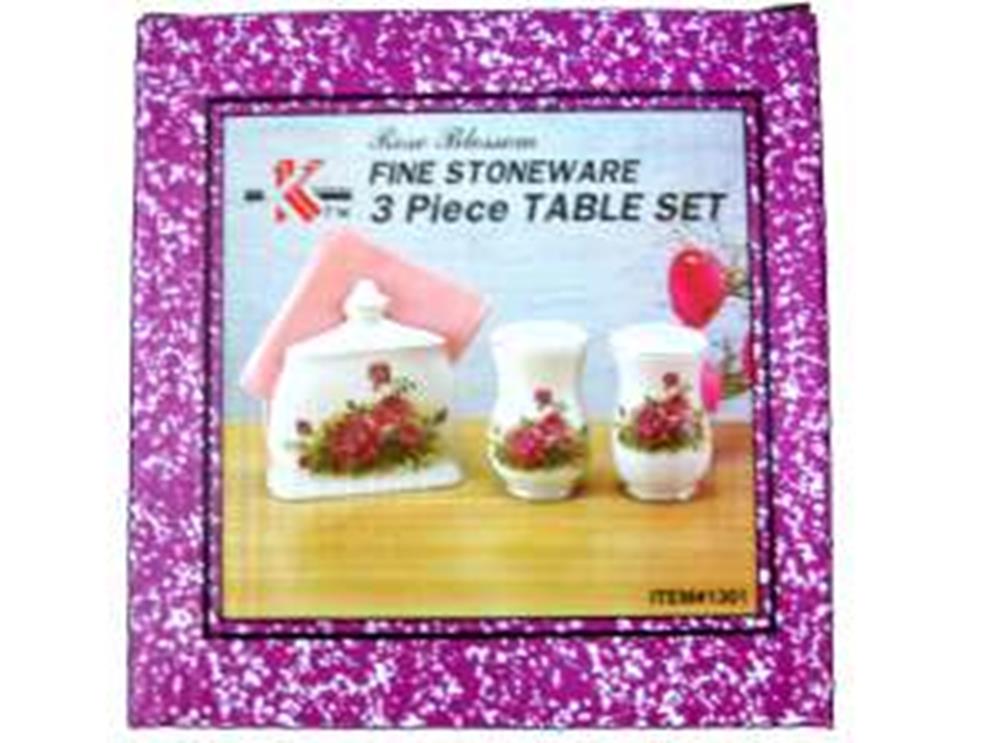 Rose-themed ceramic sugar bowl, creamer, and salt shaker with pink lids in a purple floral box.