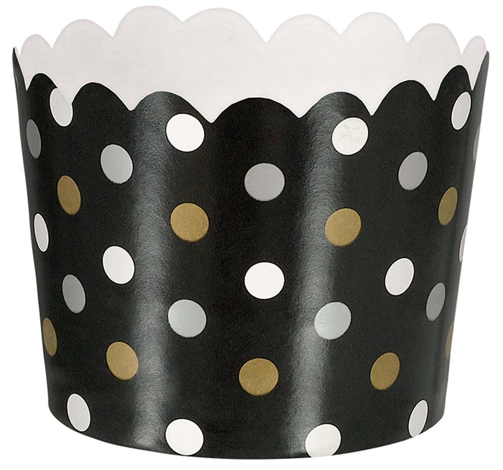 Black scalloped paper cup with white and gold polka dots and a wavy rim.