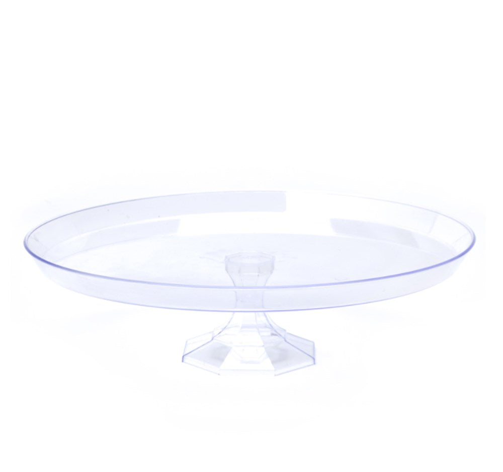 Clear plastic cake stand with a 13-inch round flat top and a wide pedestal base.
