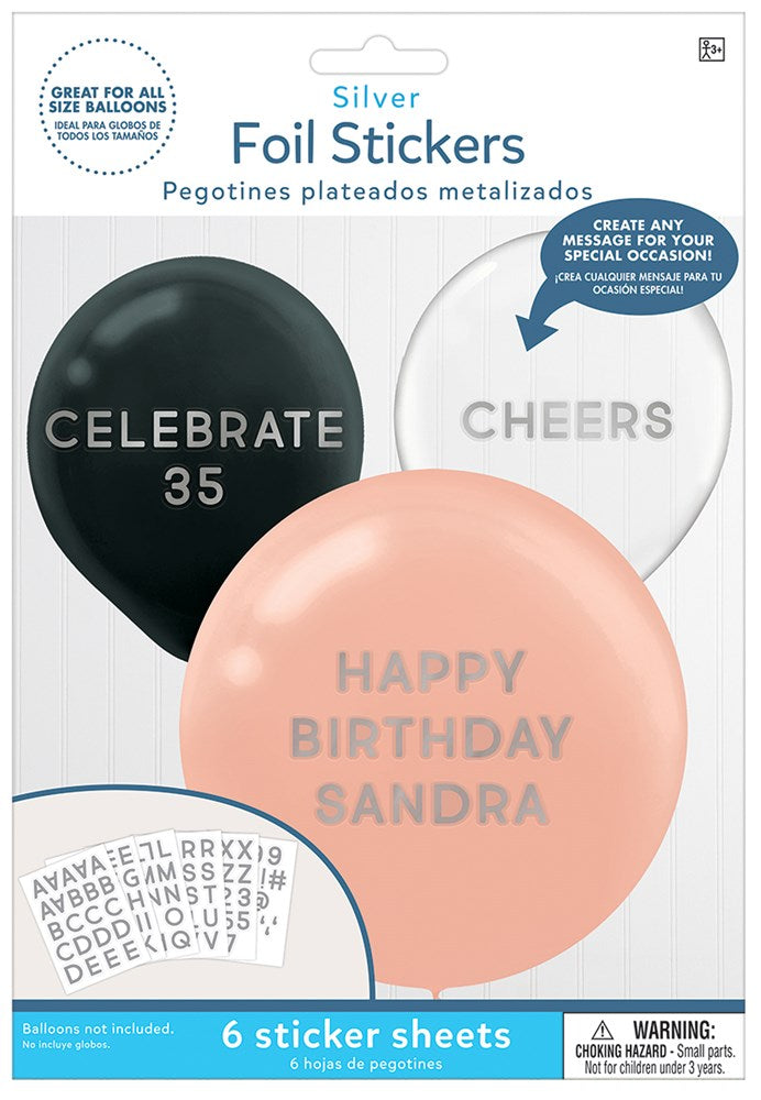 Six silver foil balloon-shaped stickers with birthday messages on black, white, and pink backgrounds.