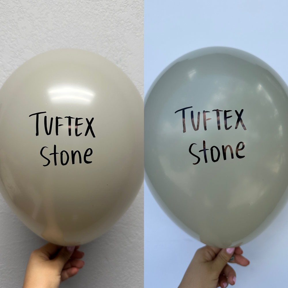 Two 5-inch round latex balloons, one beige and one gray, each with "Tuftex Stone" printed in black text.