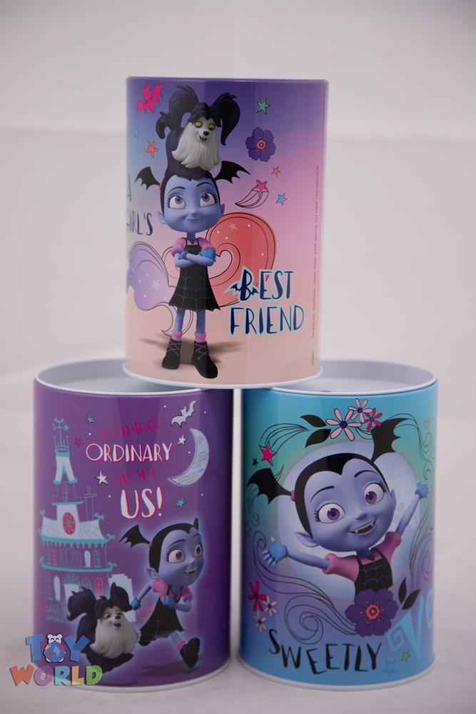Three colorful cylindrical coin banks featuring Vampire character designs and birthday-themed illustrations in purple, pink,