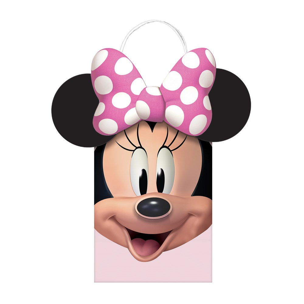 Paper bag featuring Minnie Mouse’s face with black ears and a large pink bow with white polka dots.