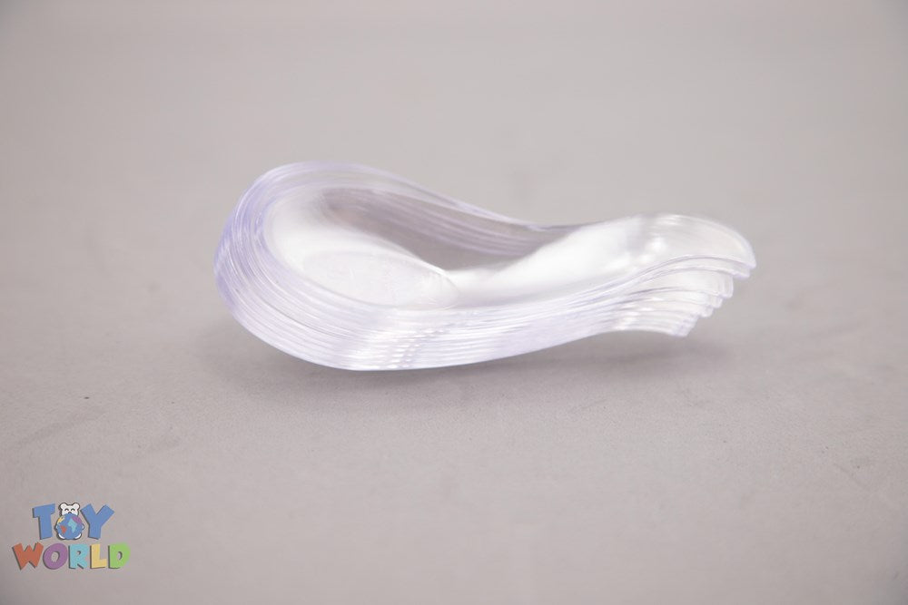 Stack of clear three-inch plastic mini dessert spoons with curved handles on a neutral surface.