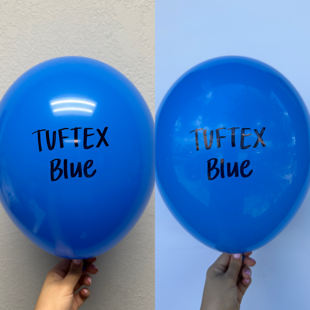 Bright blue latex balloons, 17 inches, round shape, smooth shiny surface, black "Tuftex Blue" text printed on front and back.
