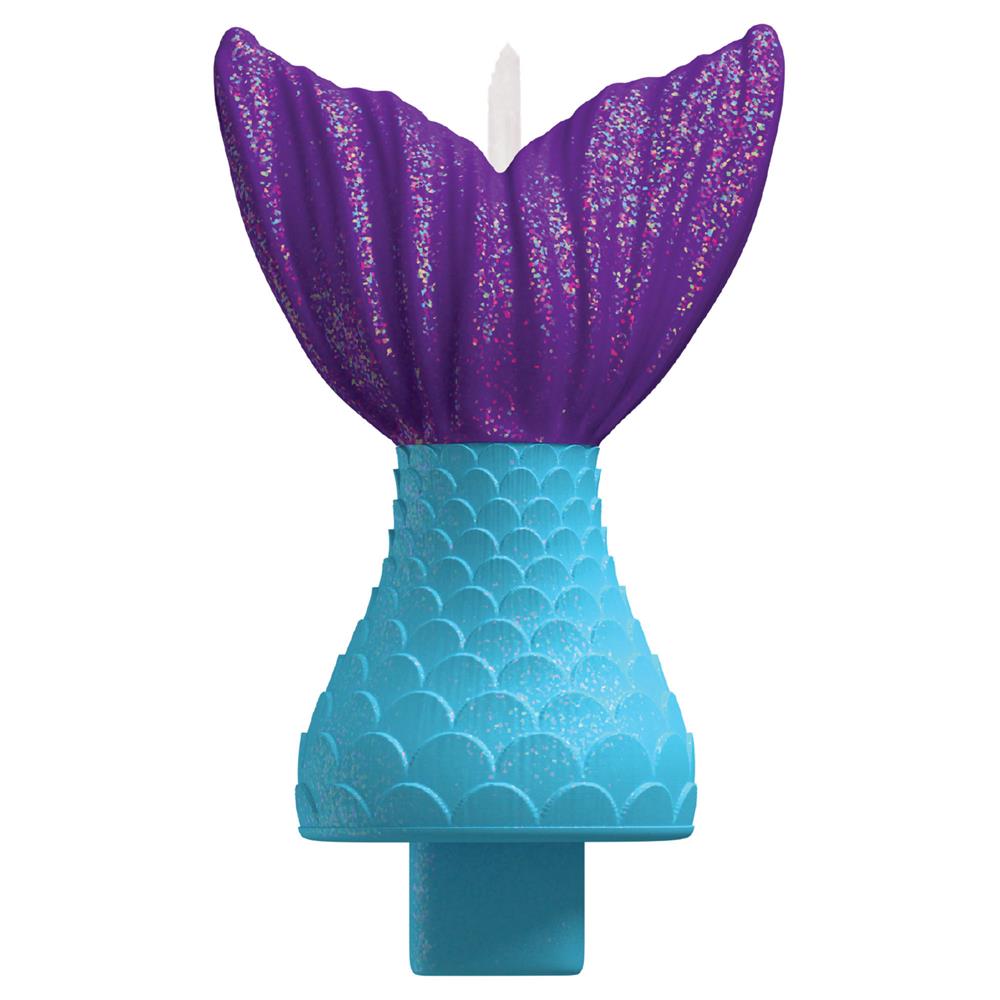 Purple glittery mermaid tail candle with blue scaled base for birthday cakes.