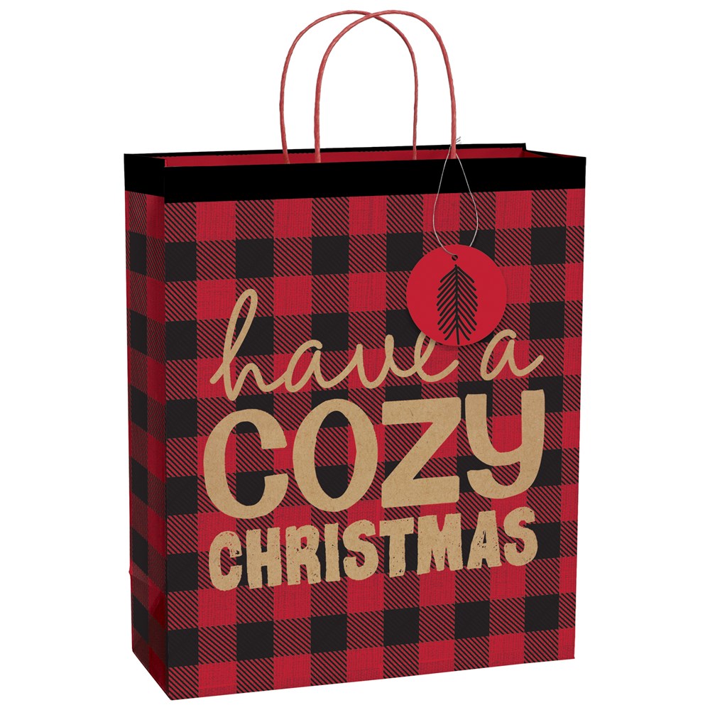 Red and black buffalo plaid gift bag with red handles, round tree tag, and gold "have a cozy Christmas" text.
