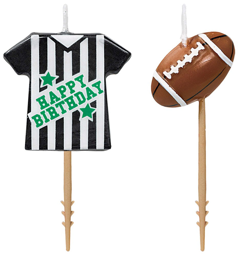 One shaped like a black and white striped referee jersey with green "Happy Birthday" text and stars, the other a brown.