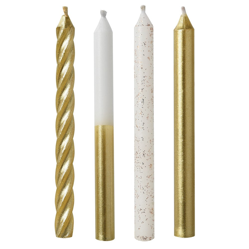Set of four slim cake candles in metallic gold, white with gold dip, white with gold speckles, and solid gold designs.