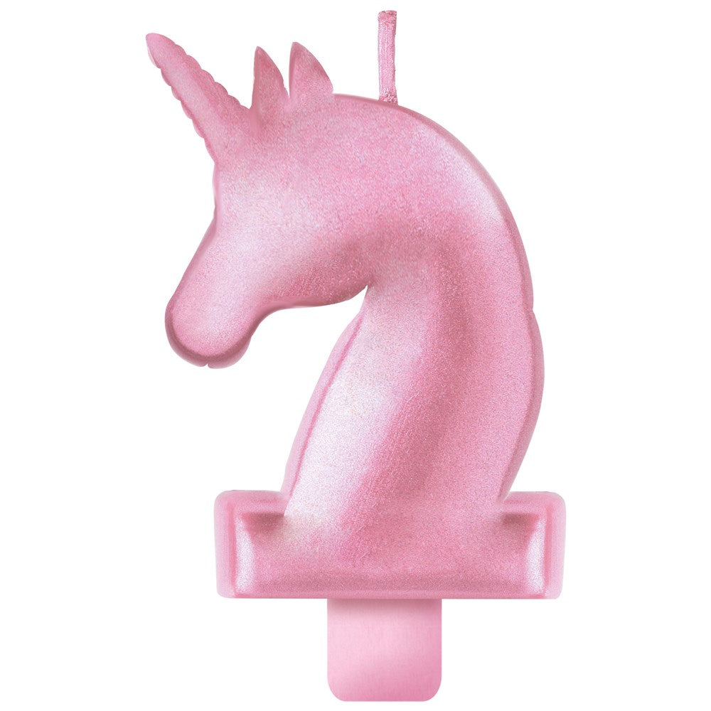 Pink metallic unicorn-shaped birthday candle with a single wick and flat base.