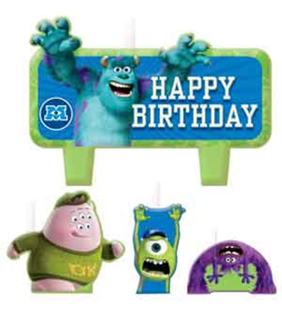 Monsters University birthday cake toppers with Sulley, Mike, and two themed sign candles.