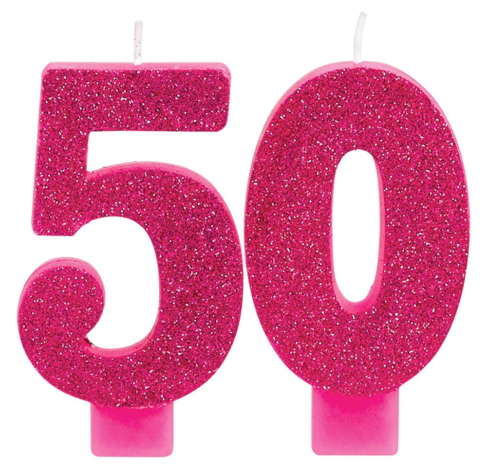 Pink-glittered numeral candles shaped as 5 and 0 with white wicks and pink bases.