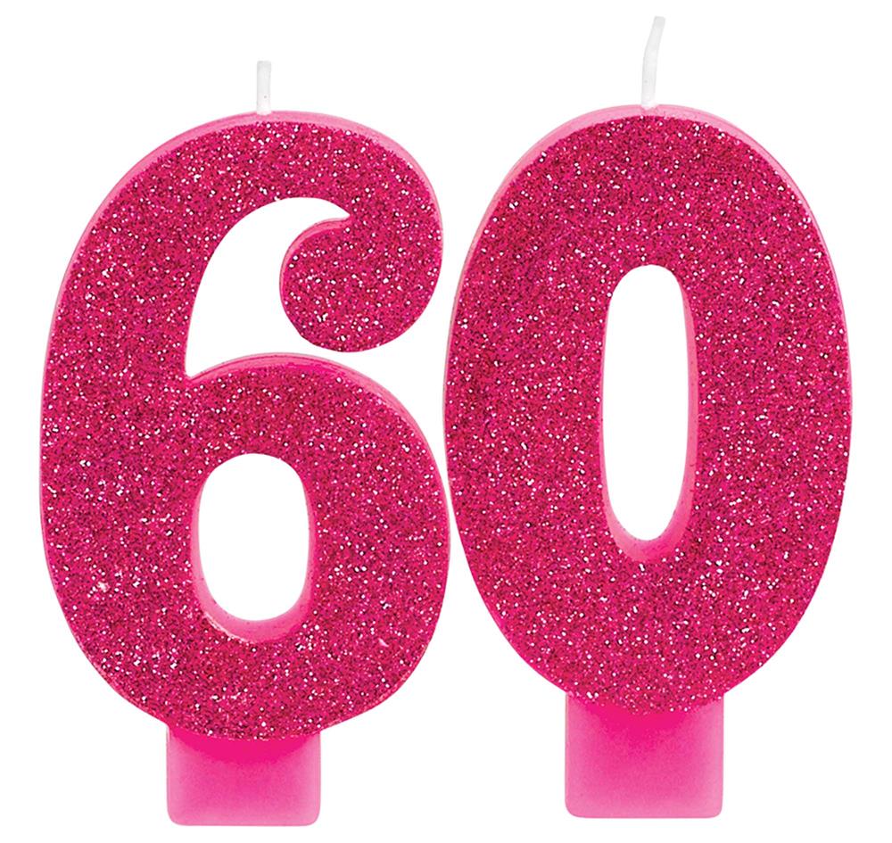 Pink glittered numeral candles shaped as 6 and 0 with white wicks and pink bases.