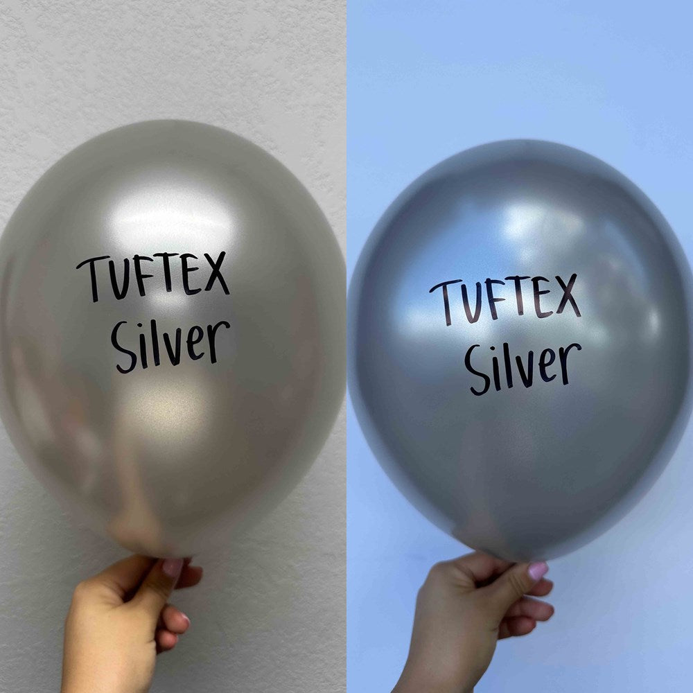 Two 17-inch metallic latex balloons in silver shades, one lighter and one darker, each held by a hand.