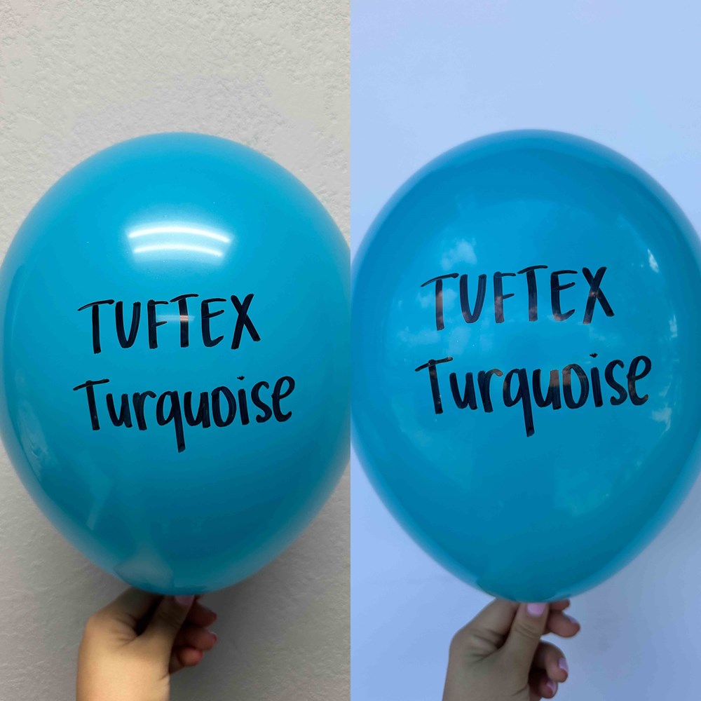 Two glossy turquoise latex balloons with "Tuftex Turquoise" printed in black, each held by a hand against a white and blue.