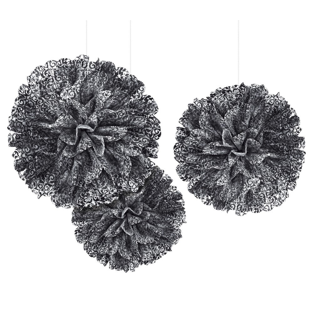 Three black scroll lace fluffy decorative pom-poms hanging at varying heights.