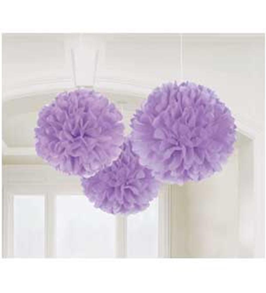 Three lilac fluffy tissue paper pom-poms hanging from white strings for party decor.