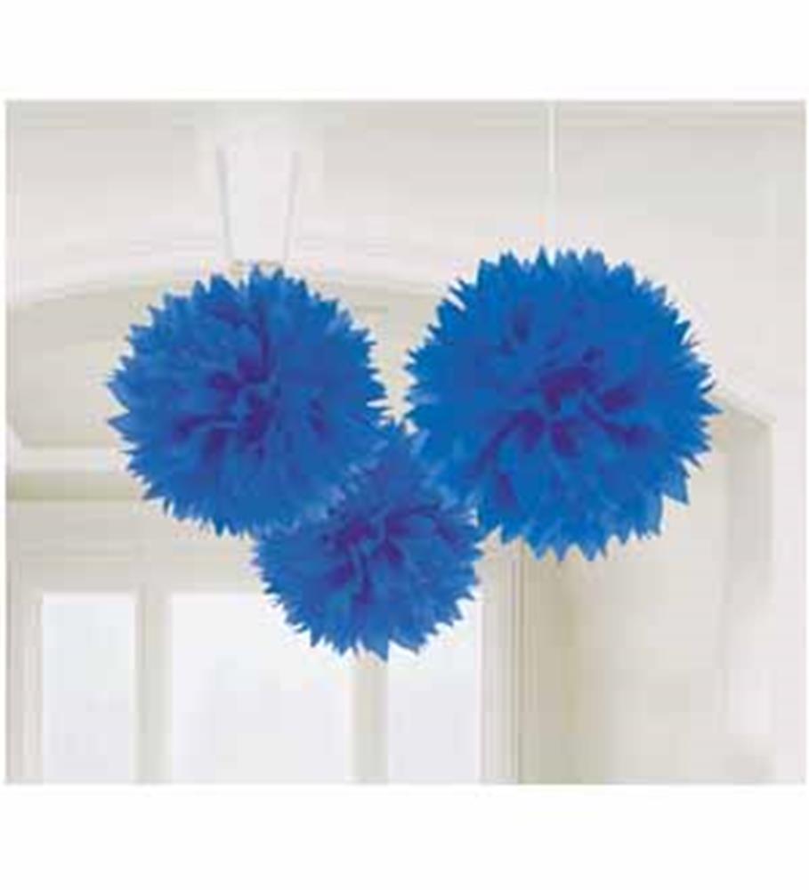 Three bright royal blue fluffy paper pom-pom decorations hanging from the ceiling.