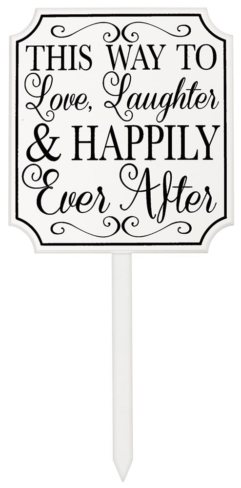 White rectangular lawn sign with ornate black script reading "This Way To Love, Laughter & Happily Ever After" on a white.