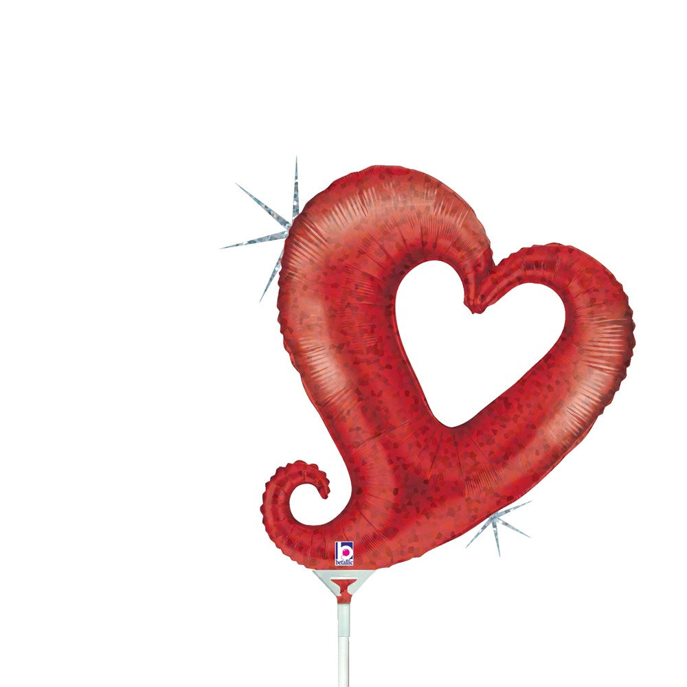 Red holographic heart-shaped foil balloon with curled tail and reflective shine.