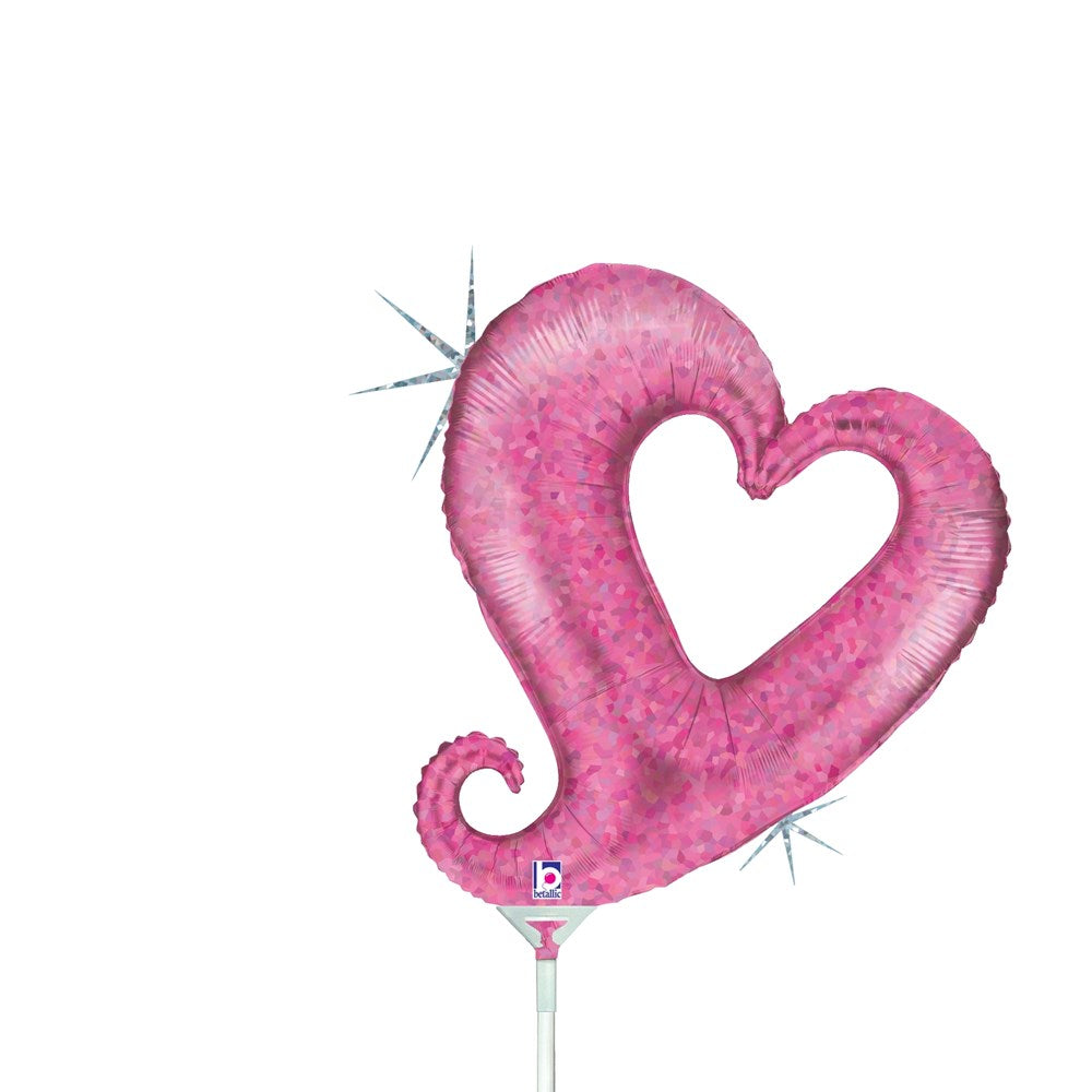 Pink holographic heart-shaped balloon with a curled tail and sparkling highlights.