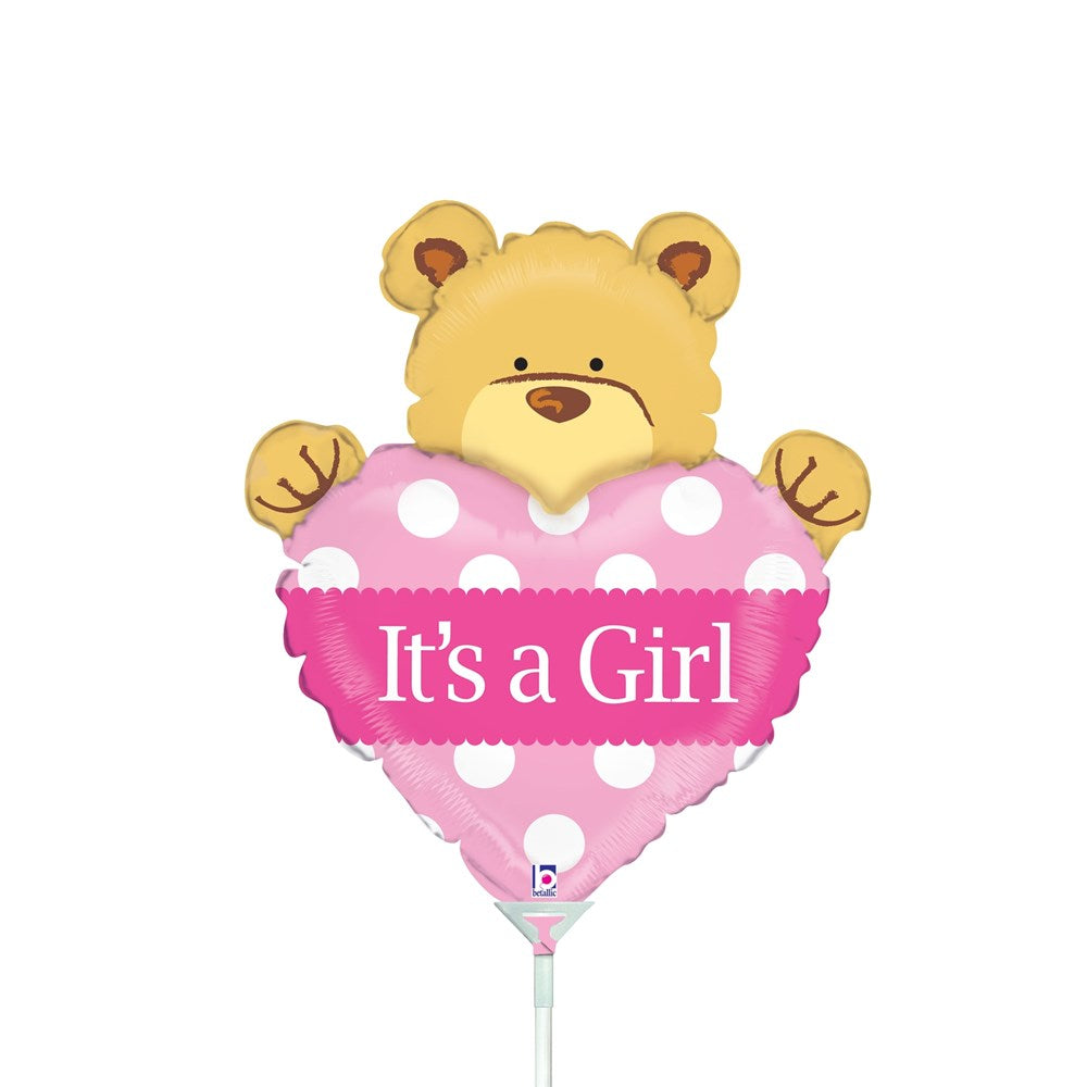 14-inch heart-shaped pink foil balloon with white polka dots and "It's a Girl" text, topped with a cute bear face and paws.