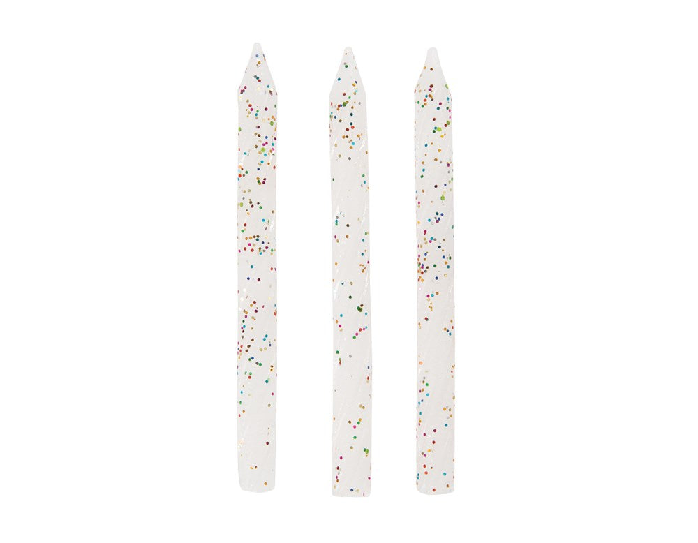 Set of three white birthday candles with spiral grooves and multicolored glitter accents.