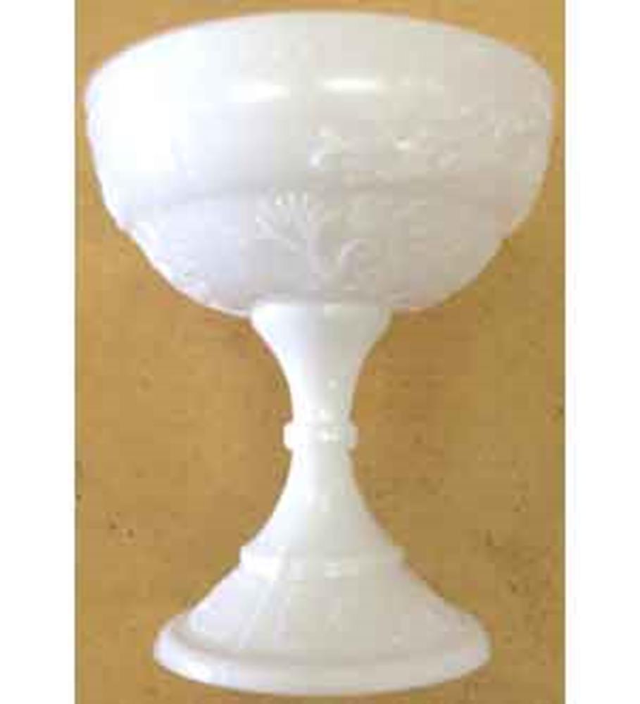 White plastic chalice-shaped cup with embossed floral details and a wide base.