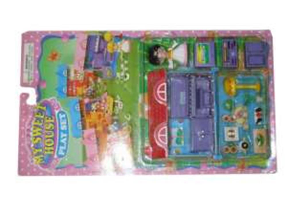 Colorful plastic playhouse toy set with purple and red parts, featuring miniature furniture and accessories in blister.