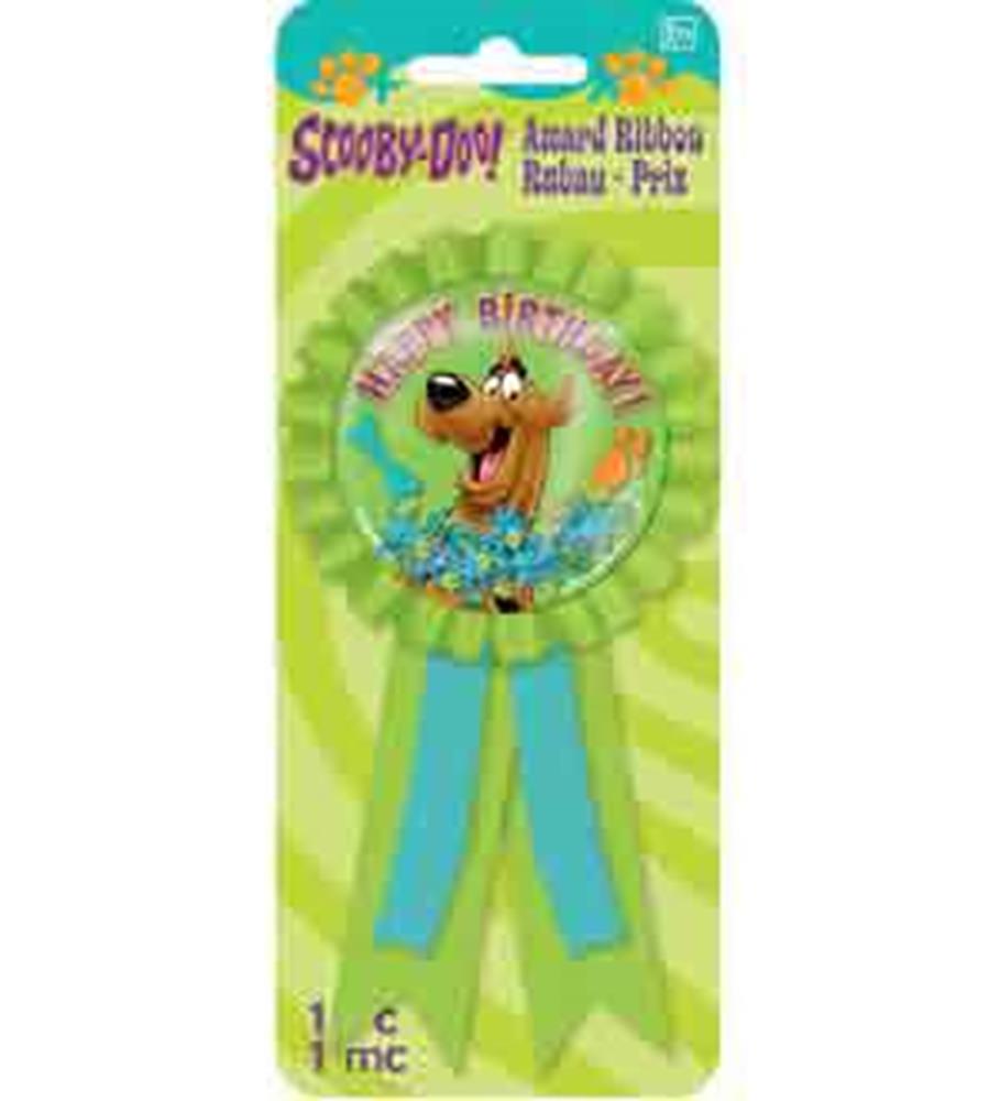 Round award ribbon with Scooby-Doo face in center, blue and green scalloped edges, blue ribbons hanging below, "Happy.