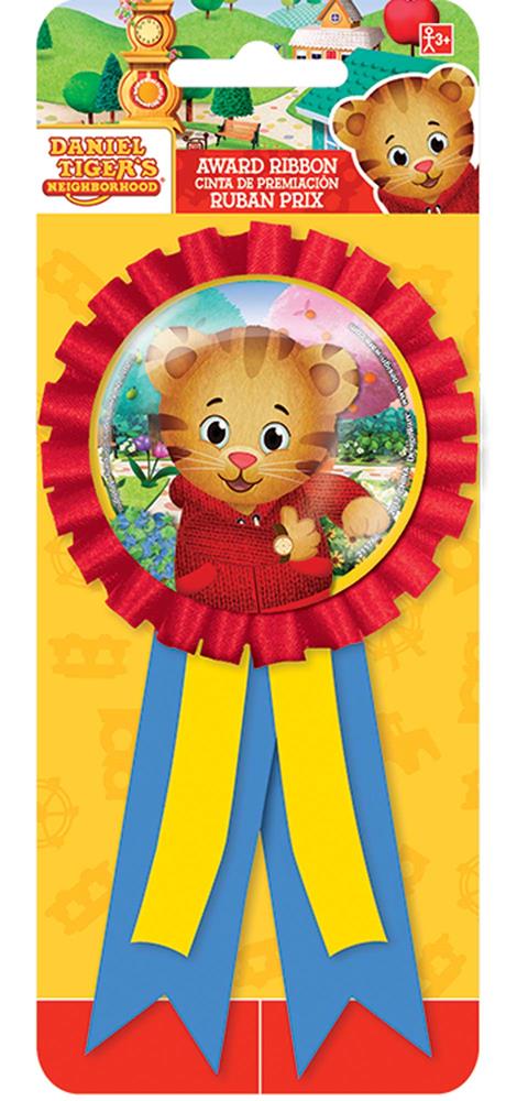 Red award ribbon with Daniel Tiger’s face in the center, blue and yellow hanging tails, packaged on a colorful card.