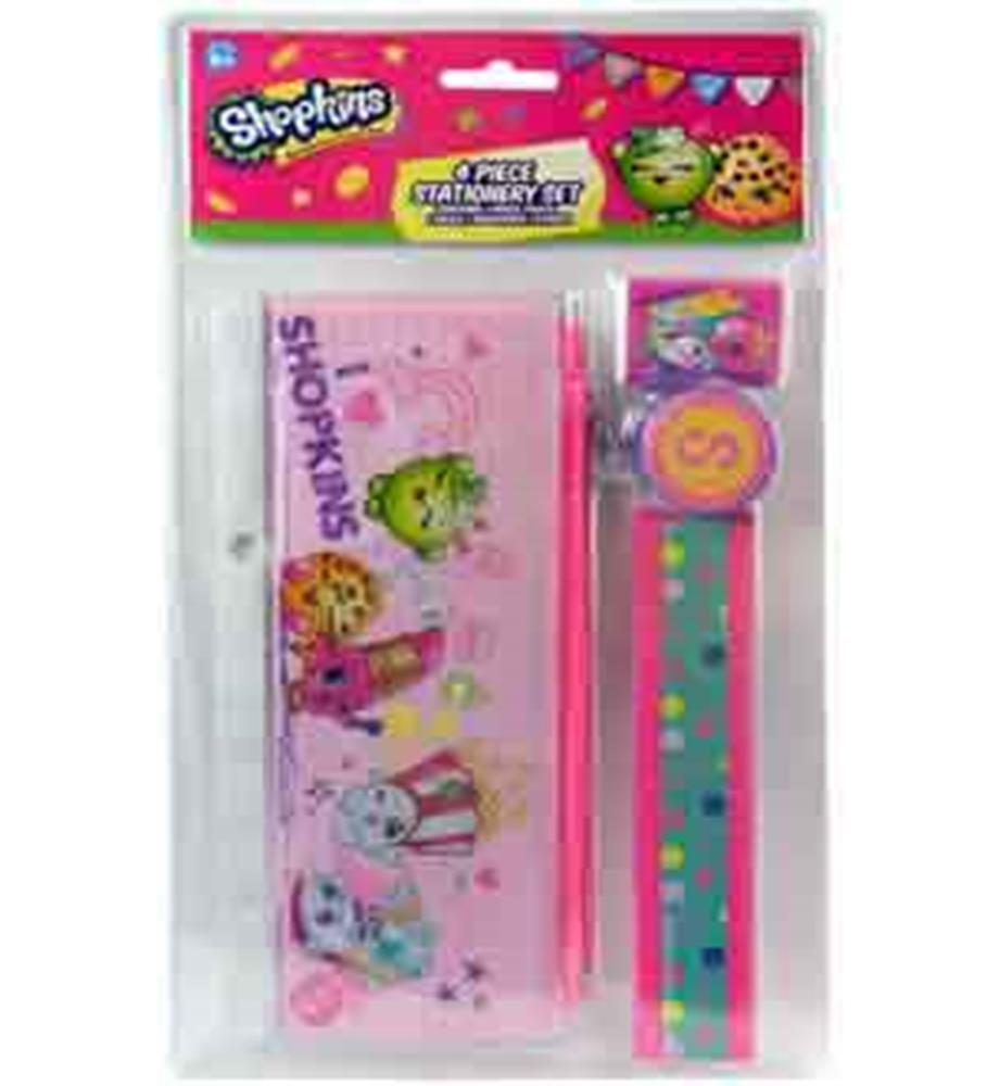 Pink plastic Shopkins pencil case with colorful character prints, matching eraser, sharpener, and ruler set.